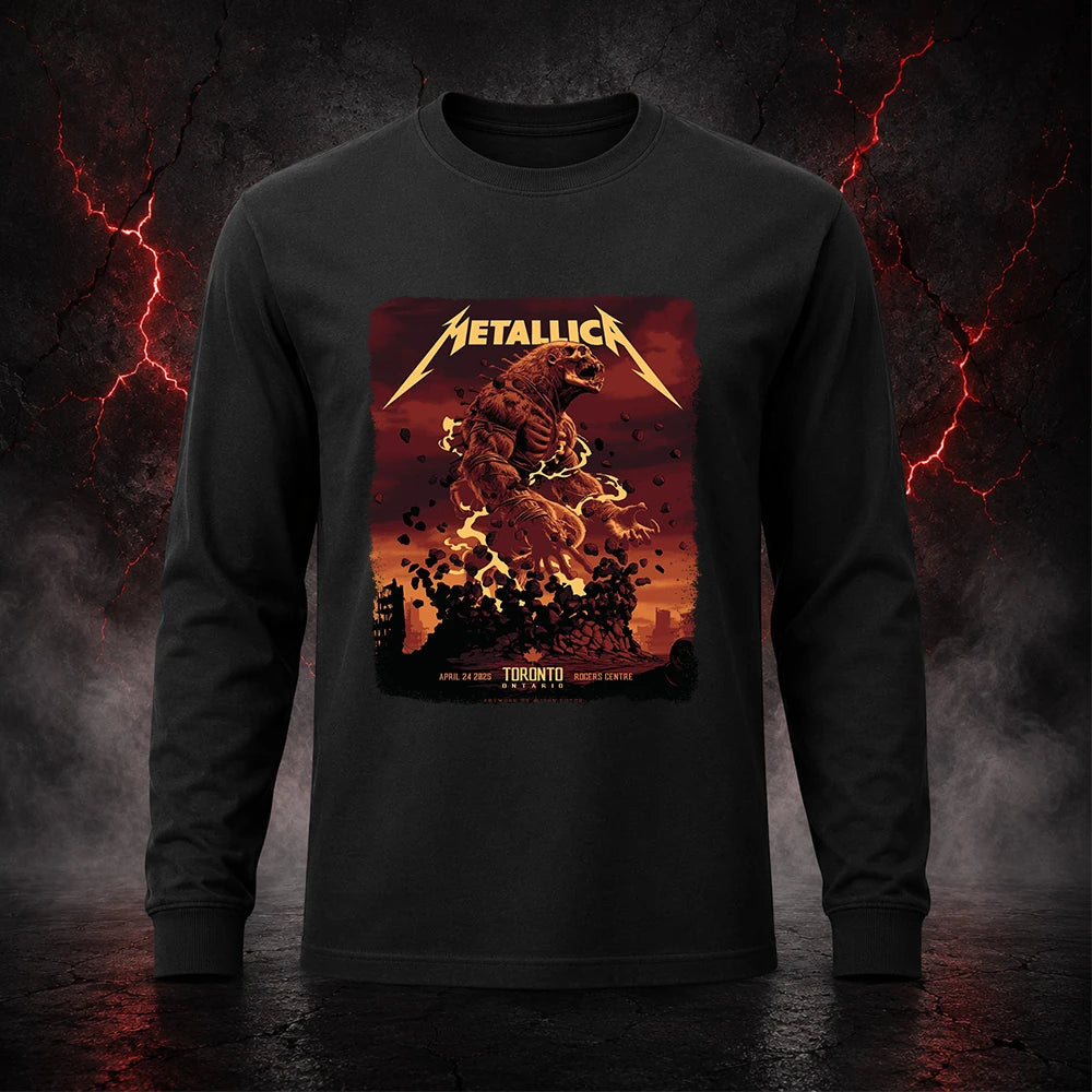 Metallica M72 World Tour April 24 2025 Rogers Centre Toronto Ontario Canada T-shirt by John Guydo featuring a roaring beast rising from shattered rubble with flying debris, fiery red-orange sky and Toronto event text.