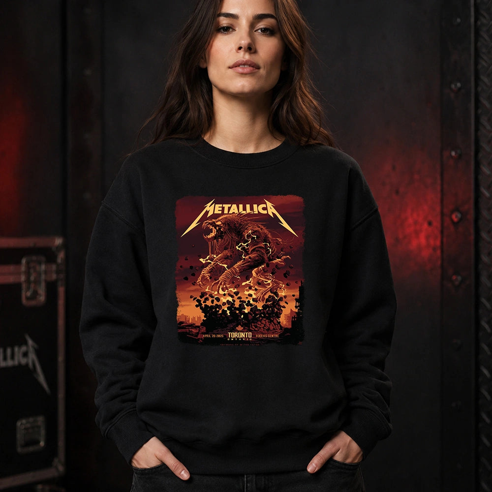 Metallica M72 World Tour April 26 2025 Rogers Centre Toronto Ontario Canada T-shirt by John Guydo featuring a roaring beast rising from shattered debris with flying rocks, fiery red-orange sky and Toronto event text.