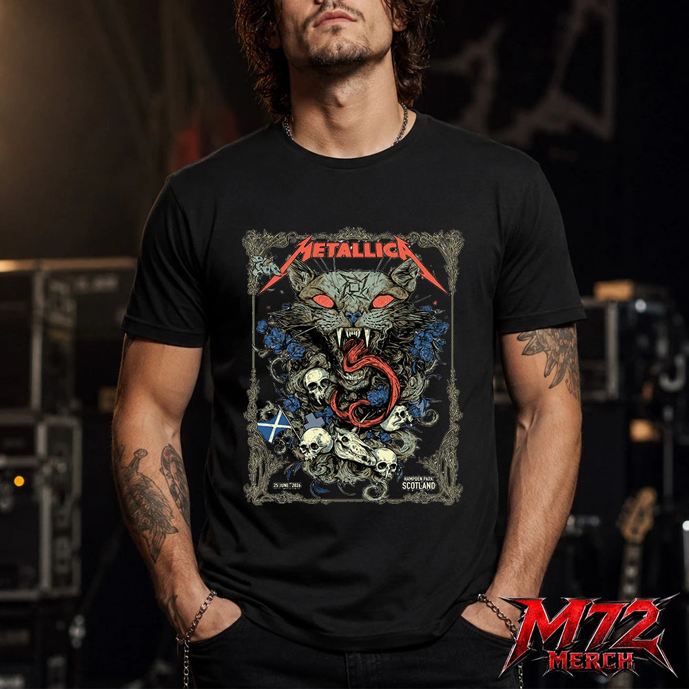Metallica M72 World Tour June 25 2026 Glasgow Scotland Hampden Park T-Shirt featuring Scottish Wildcat Skull Artwork by WolfSkullJack with fierce wildcat, glowing red eyes, sharp fangs, skulls, blue flowers, ornate gothic border, Scotland flag detail, and dark heavy metal artwork