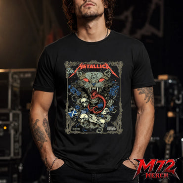Metallica M72 World Tour June 25 2026 Glasgow Scotland Hampden Park T-Shirt featuring Scottish Wildcat Skull Artwork by WolfSkullJack with fierce wildcat, glowing red eyes, sharp fangs, skulls, blue flowers, ornate gothic border, Scotland flag detail, and dark heavy metal artwork