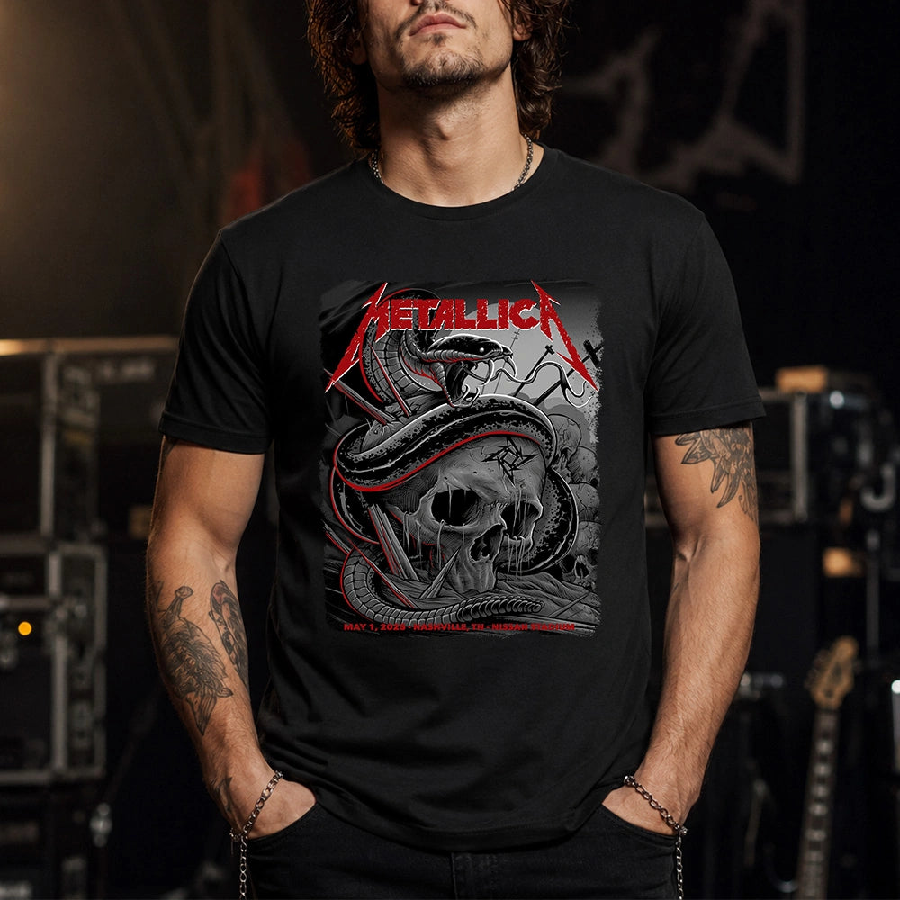 Metallica M72 World Tour May 1 2025 Nissan Stadium Nashville Tennessee United States T-shirt by Maxx242 featuring a coiled black serpent wrapped around a weathered skull with graveyard silhouettes and Nashville event text.