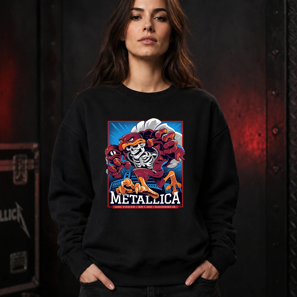 Metallica M72 World Tour May 7 2025 Lane Stadium Blacksburg Virginia United States T-shirt by Moe Dime featuring a charging bird mascot creature with a skeleton chest, sharp talons, stadium backdrop and Blacksburg event text.