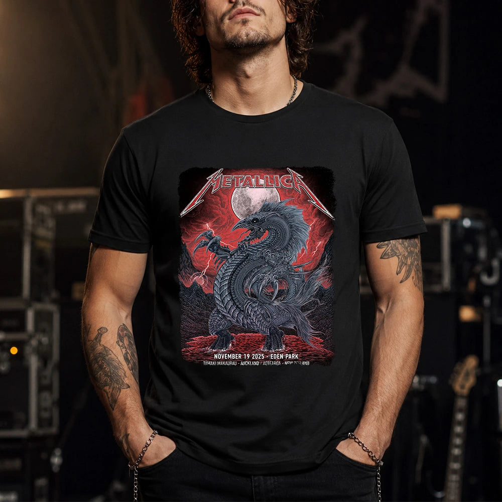 Metallica M72 World Tour November 19 2025 Eden Park Auckland New Zealand T-shirt by Mr. Wolf featuring a taniwha raven creature, full moon, red storm clouds, lightning, mountains and Auckland event text.