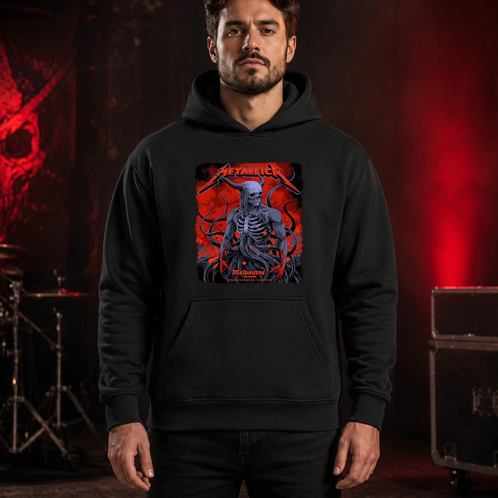 Metallica M72 World Tour November 8 2025 Marvel Stadium Melbourne Australia T-shirt by Ken Taylor featuring a horned skeletal figure, exposed ribcage, twisting tendrils, red smoke, infernal landscape and Melbourne event text.