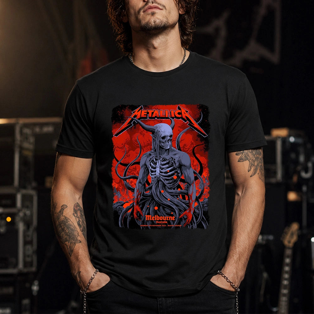 Metallica M72 World Tour November 8 2025 Marvel Stadium Melbourne Australia T-shirt by Ken Taylor featuring a horned skeletal figure, exposed ribcage, twisting tendrils, red smoke, infernal landscape and Melbourne event text.